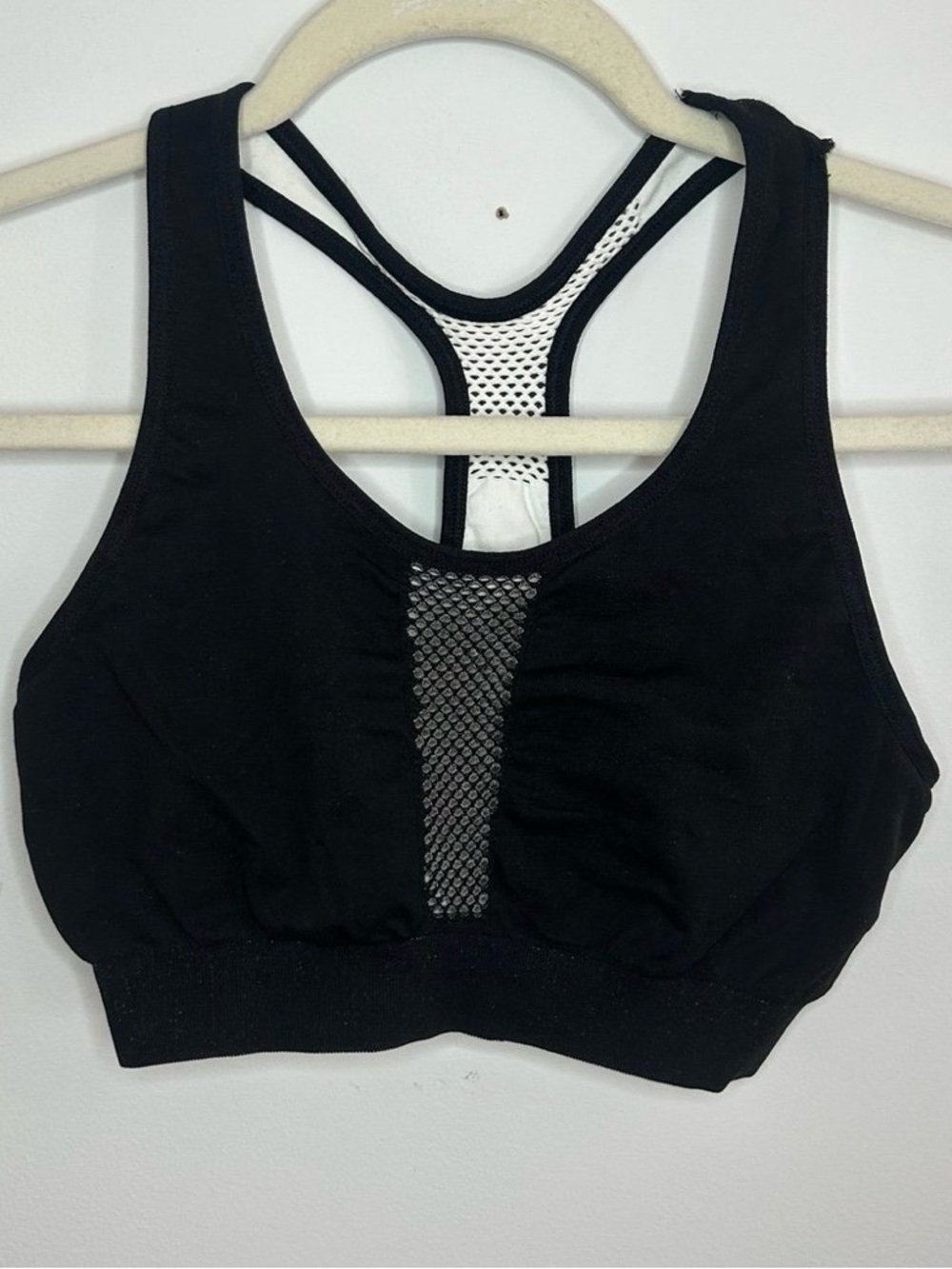 NUX NWOT Black Sports Bra with mesh pattern size medium